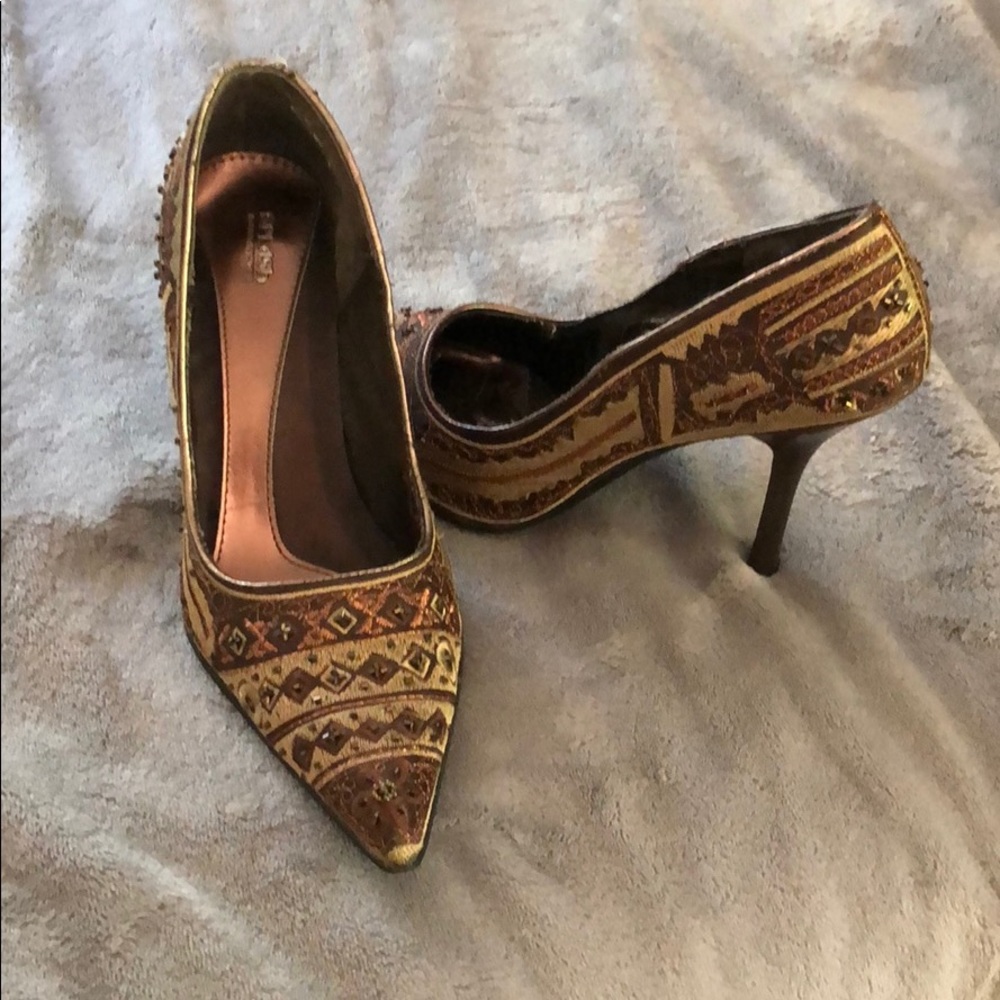 Jewel brown and gold stiletto heels.